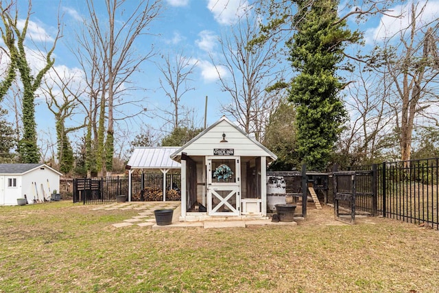 view of shed with a fenced backyard