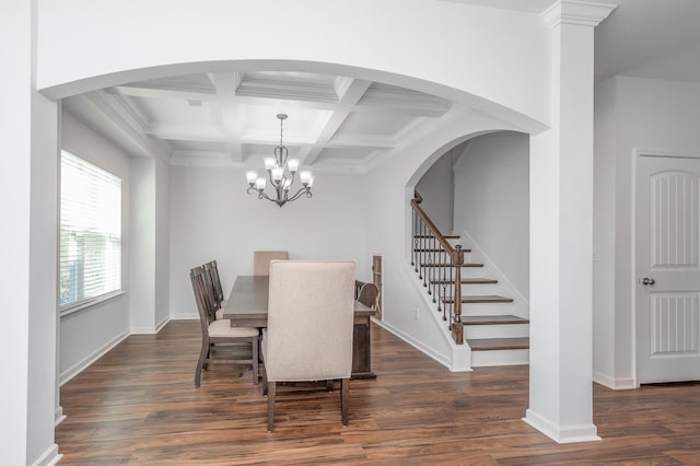 dining area featuring baseboards and wood finished floors