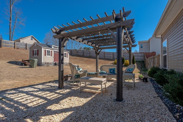 view of jungle gym with an outbuilding, a fenced backyard, and a pergola