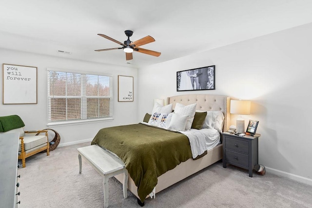 bedroom with baseboards, visible vents, and carpet flooring