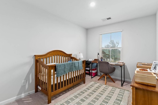 bedroom featuring carpet flooring, visible vents, and baseboards