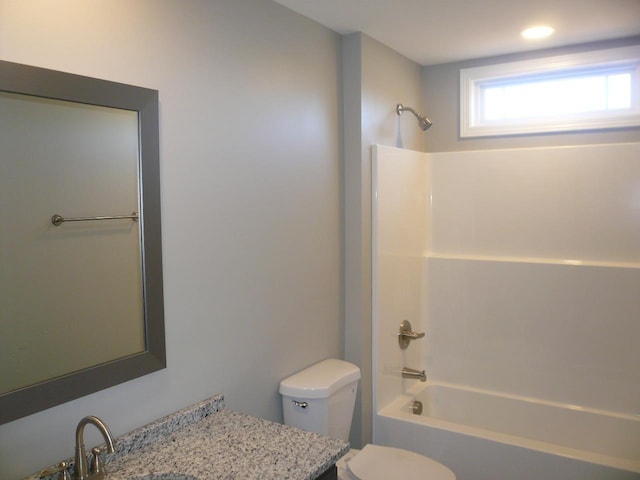 full bathroom with toilet, vanity, and shower / bathing tub combination