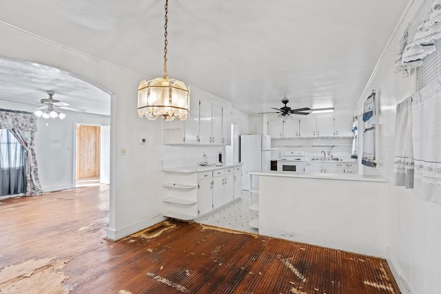 kitchen featuring arched walkways, light wood-style flooring, white appliances, white cabinets, and open shelves