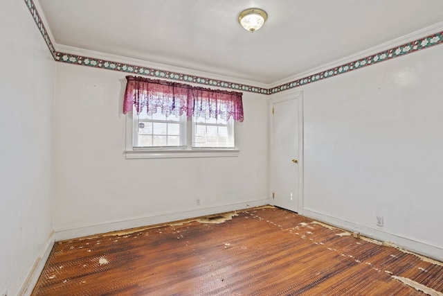 unfurnished room featuring hardwood / wood-style floors