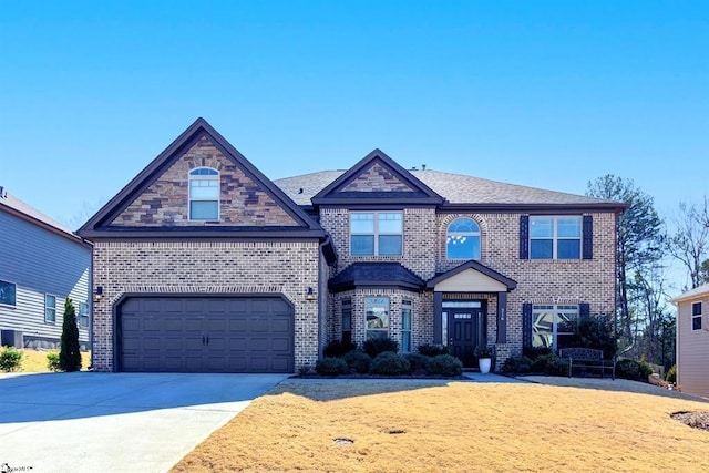 view of front facade featuring stone siding, concrete driveway, brick siding, and a front lawn