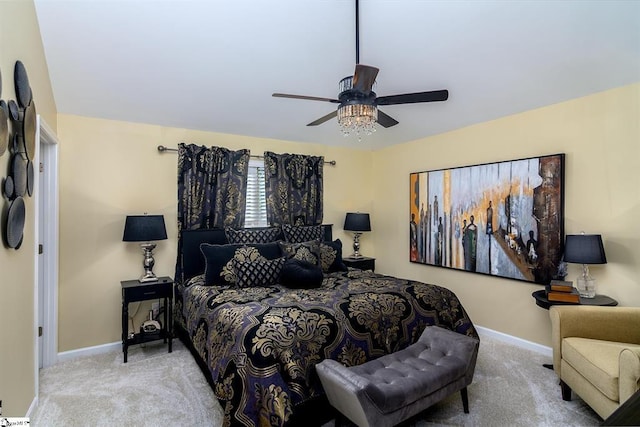 bedroom featuring a ceiling fan, carpet flooring, and baseboards