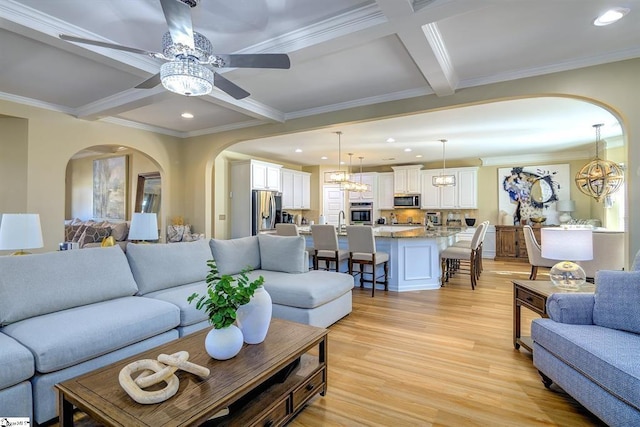 living area featuring recessed lighting, coffered ceiling, light wood finished floors, beamed ceiling, and crown molding