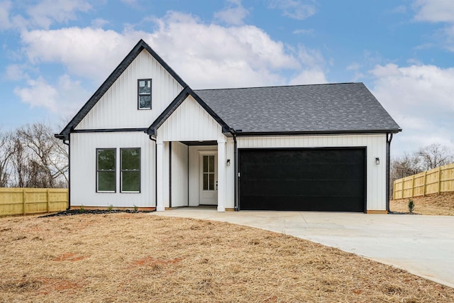 modern farmhouse style home with an attached garage, a shingled roof, fence, and concrete driveway