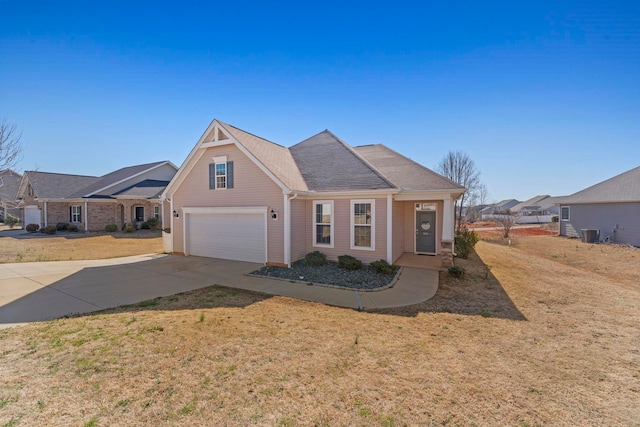 view of front of house featuring a garage, a front yard, concrete driveway, and cooling unit