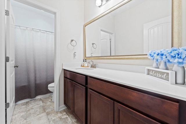 full bath with vanity and toilet