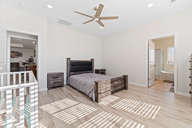 bedroom with baseboards, light wood-type flooring, visible vents, and recessed lighting