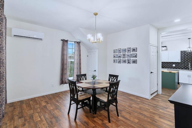dining area with a chandelier, dark wood-style flooring, a wall unit AC, and baseboards
