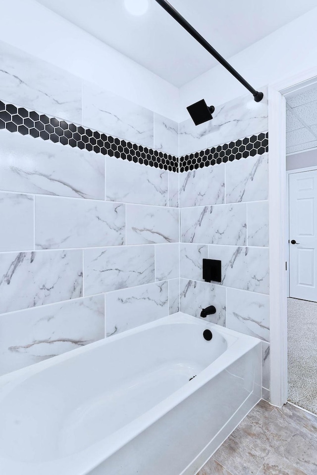bathroom featuring shower / washtub combination