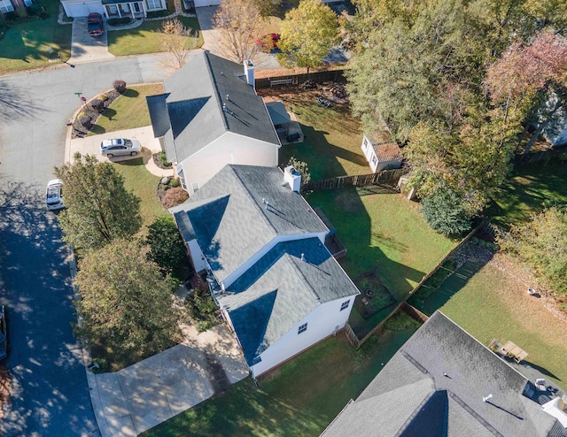 birds eye view of property with a residential view