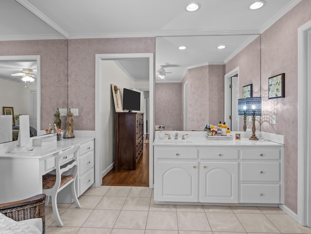 full bath featuring tile patterned floors, ornamental molding, a ceiling fan, and vanity