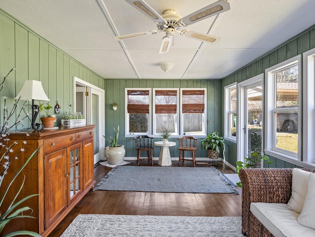 sunroom / solarium with ceiling fan