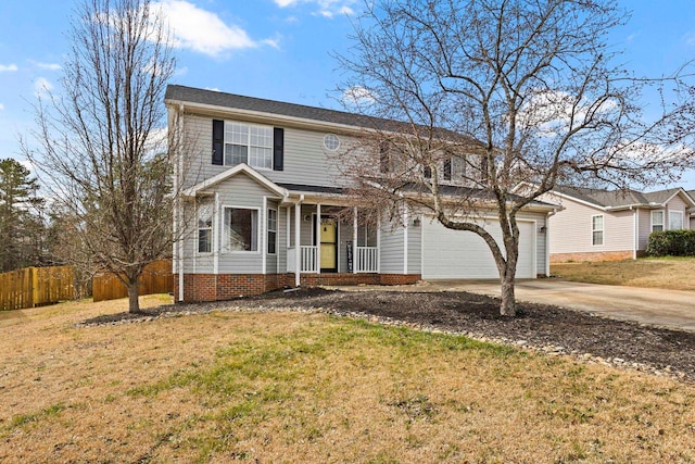 view of front of property with driveway, an attached garage, fence, a porch, and a front yard