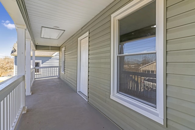 balcony featuring a porch