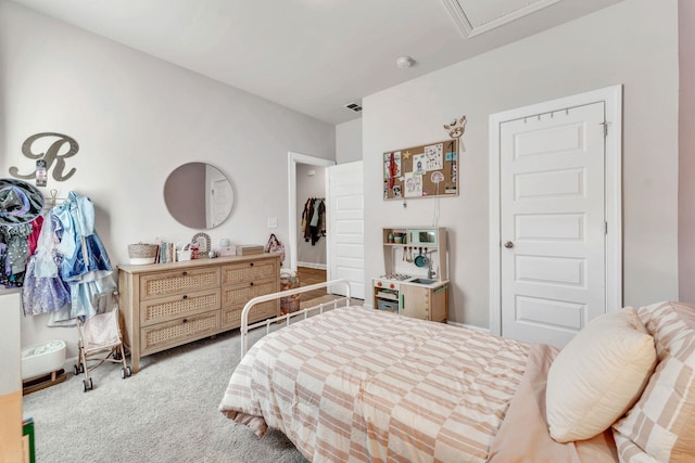 carpeted bedroom with visible vents