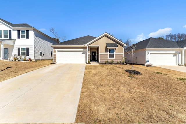 view of front of house featuring driveway and an attached garage