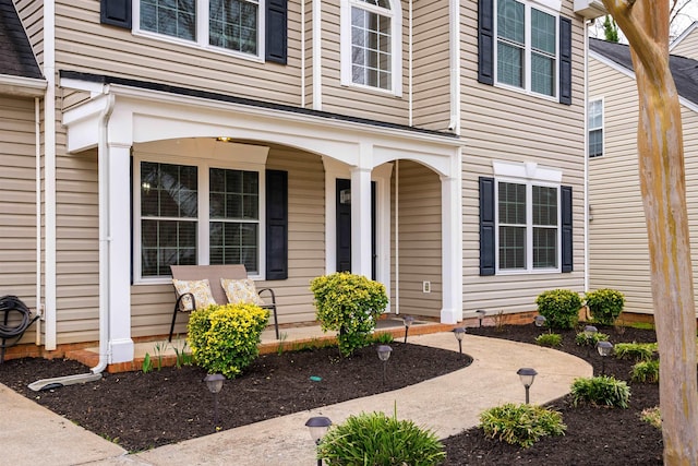 doorway to property with covered porch