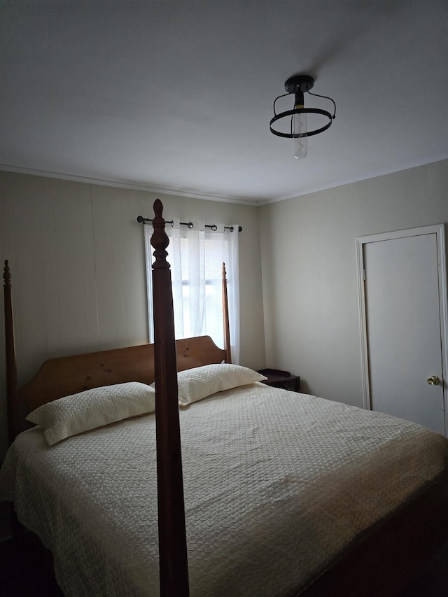 bedroom with crown molding