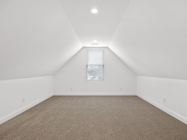 bonus room with lofted ceiling, carpet, baseboards, and recessed lighting