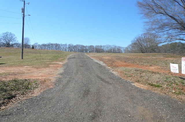 view of road featuring a rural view