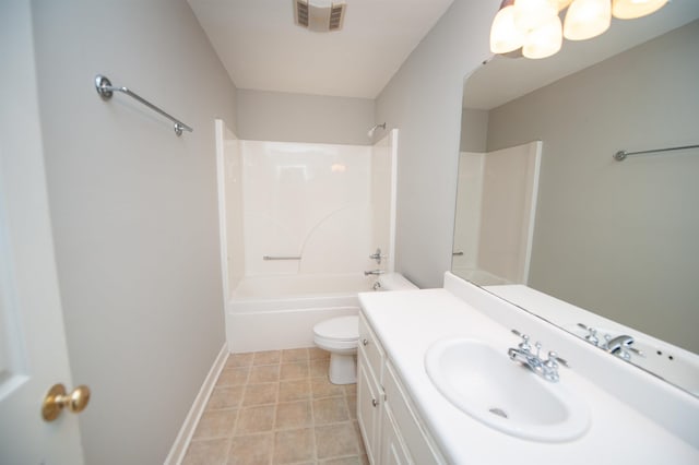 bathroom with toilet, vanity, visible vents, baseboards, and  shower combination