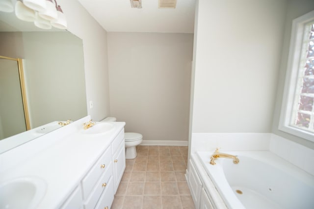 full bath with toilet, a tub with jets, a sink, and a wealth of natural light