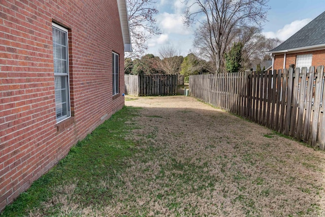 view of yard featuring a fenced backyard