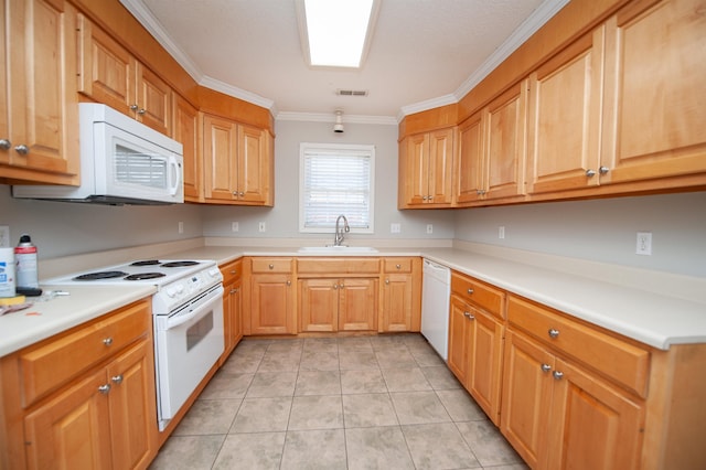 kitchen featuring white appliances, visible vents, ornamental molding, light countertops, and a sink