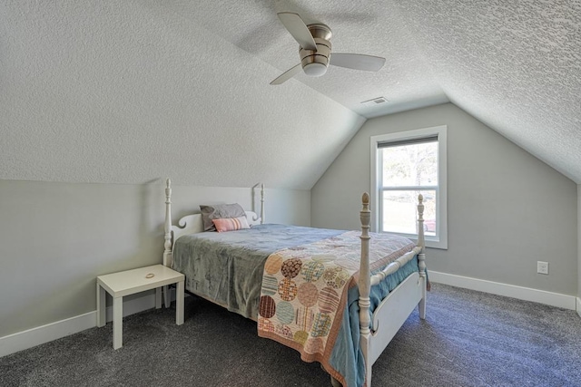 carpeted bedroom featuring visible vents, a ceiling fan, a textured ceiling, baseboards, and vaulted ceiling