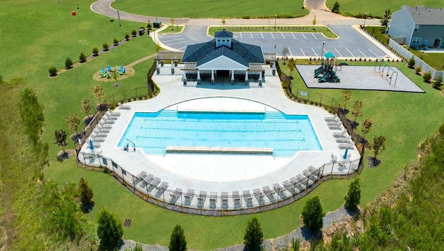 view of swimming pool with a gazebo, a patio, and fence