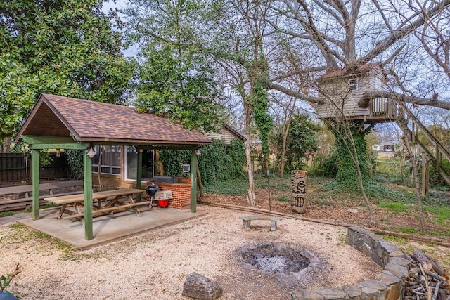 view of yard featuring a gazebo and a patio