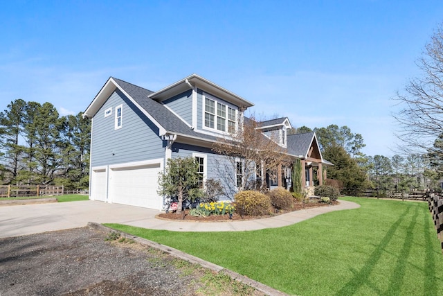 view of property exterior featuring concrete driveway, a lawn, a garage, and a shingled roof