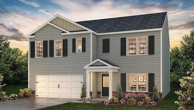 view of front facade featuring board and batten siding, a shingled roof, driveway, and a garage