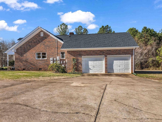 view of front facade with concrete driveway, a shingled roof, crawl space, brick siding, and a chimney