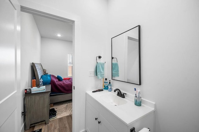 bathroom featuring vanity and wood finished floors