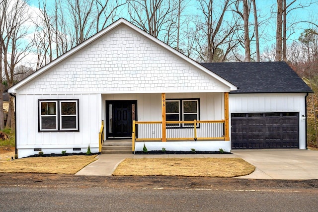 modern inspired farmhouse with board and batten siding, a porch, roof with shingles, a garage, and crawl space