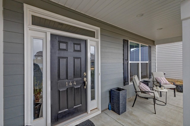 entrance to property with a porch