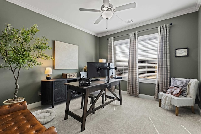 office space with ceiling fan, visible vents, light colored carpet, and ornamental molding