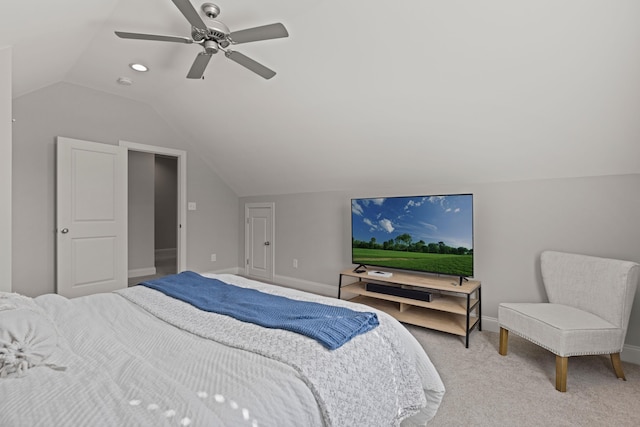 bedroom with baseboards, lofted ceiling, light carpet, and a ceiling fan