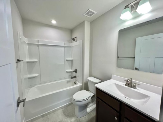 bathroom featuring vanity, toilet, tub / shower combination, and visible vents