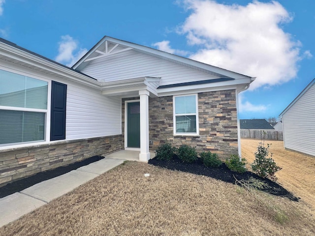 view of front of house featuring stone siding