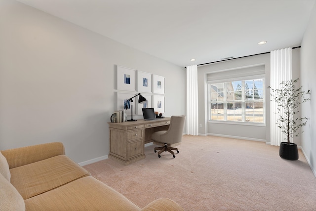 office space with recessed lighting, light colored carpet, and baseboards