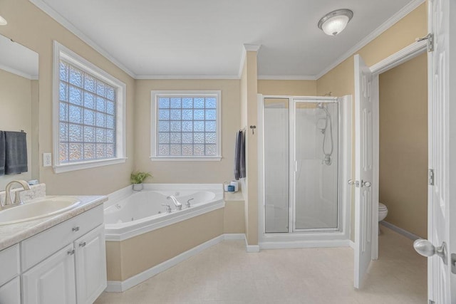 full bath featuring vanity, a tub with jets, a shower stall, crown molding, and toilet