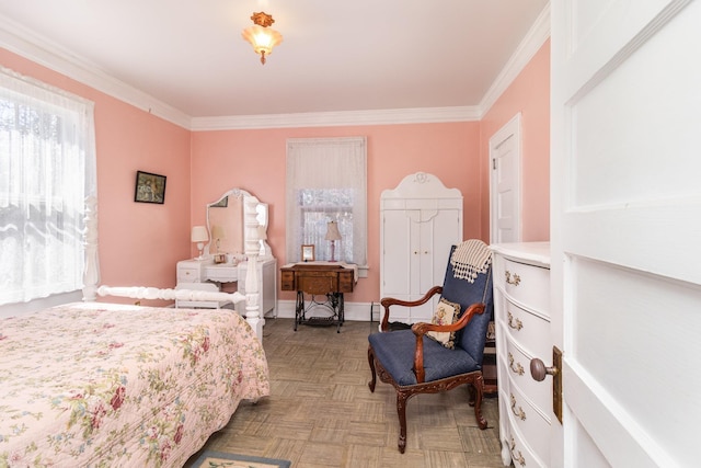 bedroom with baseboards and crown molding