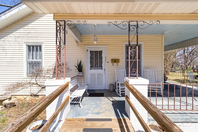 entrance to property with a porch