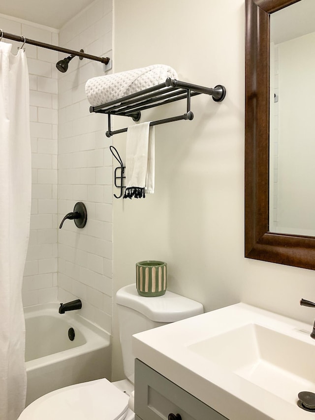 full bathroom featuring vanity, toilet, and shower / bathtub combination with curtain